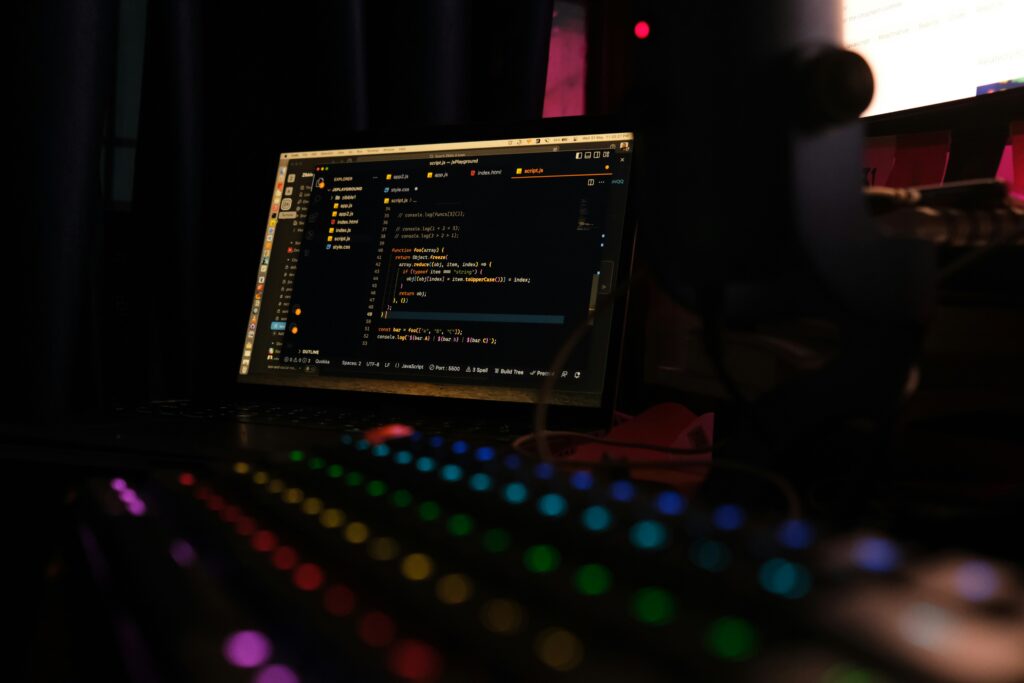 Web development coding process on laptop