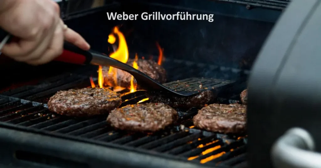Weber Grillvorführung sizzling steaks on a barbecue